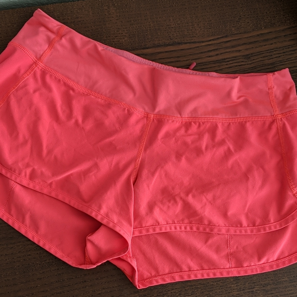 Hot pink running shorts